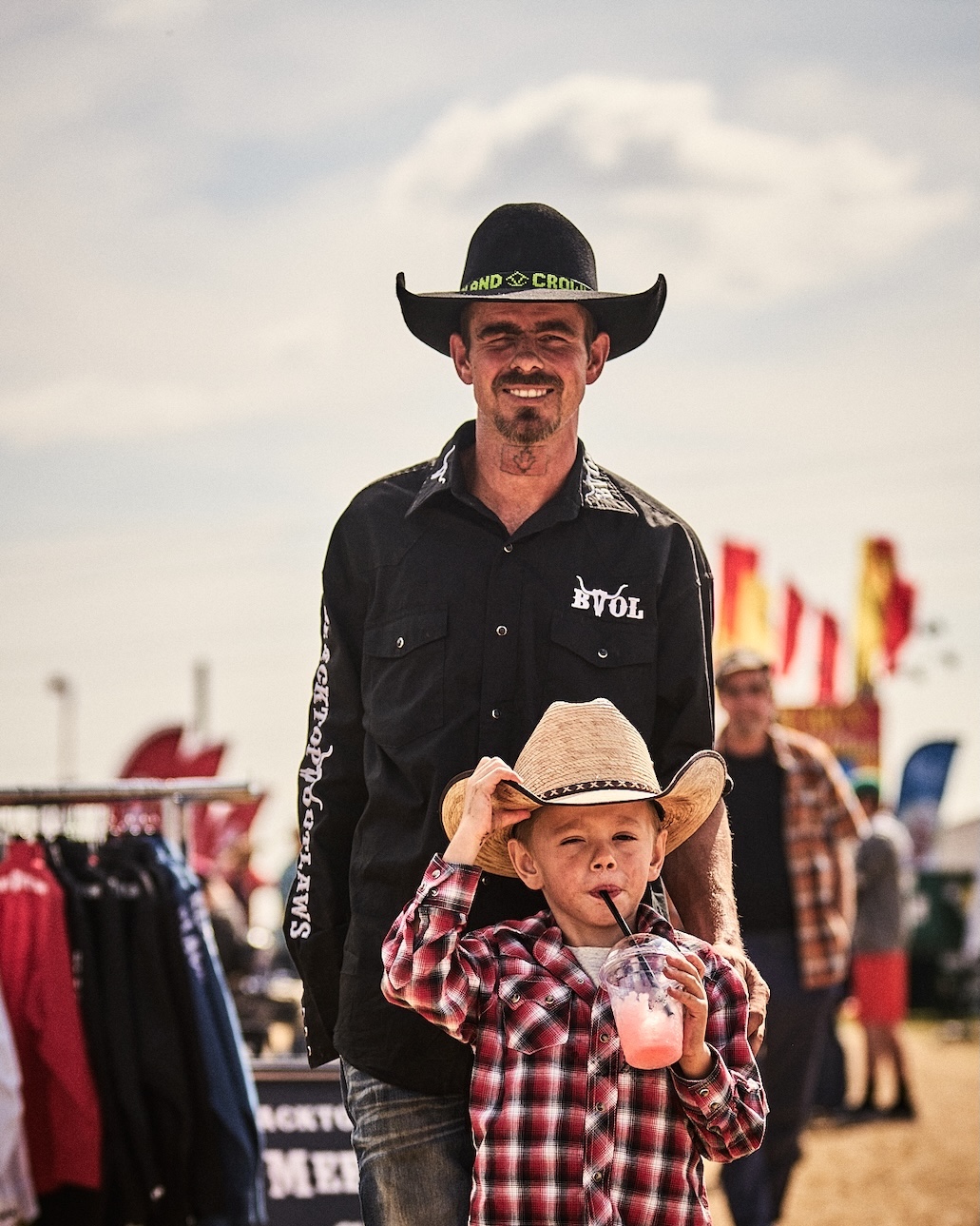 Cowboy and son portrait at the Ram Rodeo Tour.